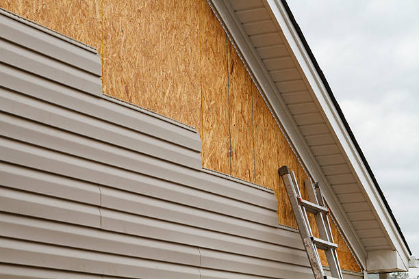 Professional Storm Damage Siding Repair technician working in Libertytown, MD